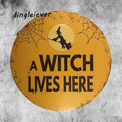 A Witch Lives Here Metal Sign